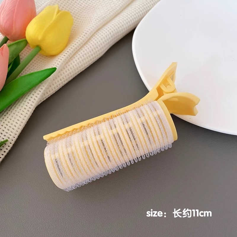 Yellow curling barrel