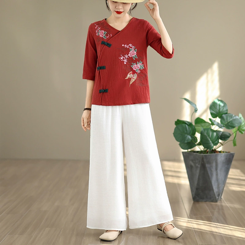 Лето 2025 года, новый китайский стиль, ретро-кнопка, вышитый улучшенный костюм Тан, топ, широкие брюки, национальный стиль, комплект чайного наряда в стиле дзен для женщин.