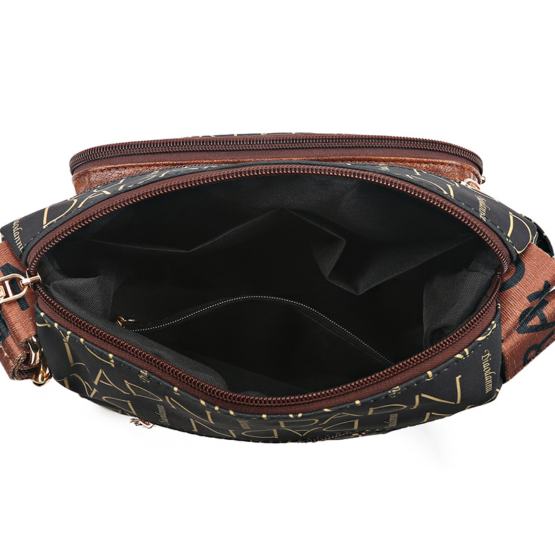 Borsa da donna 2023 Nuovo modello per anziani, borsa piccola stampata elegante di alta gamma, borsa a tracolla per donne di mezza età e_voghion.com