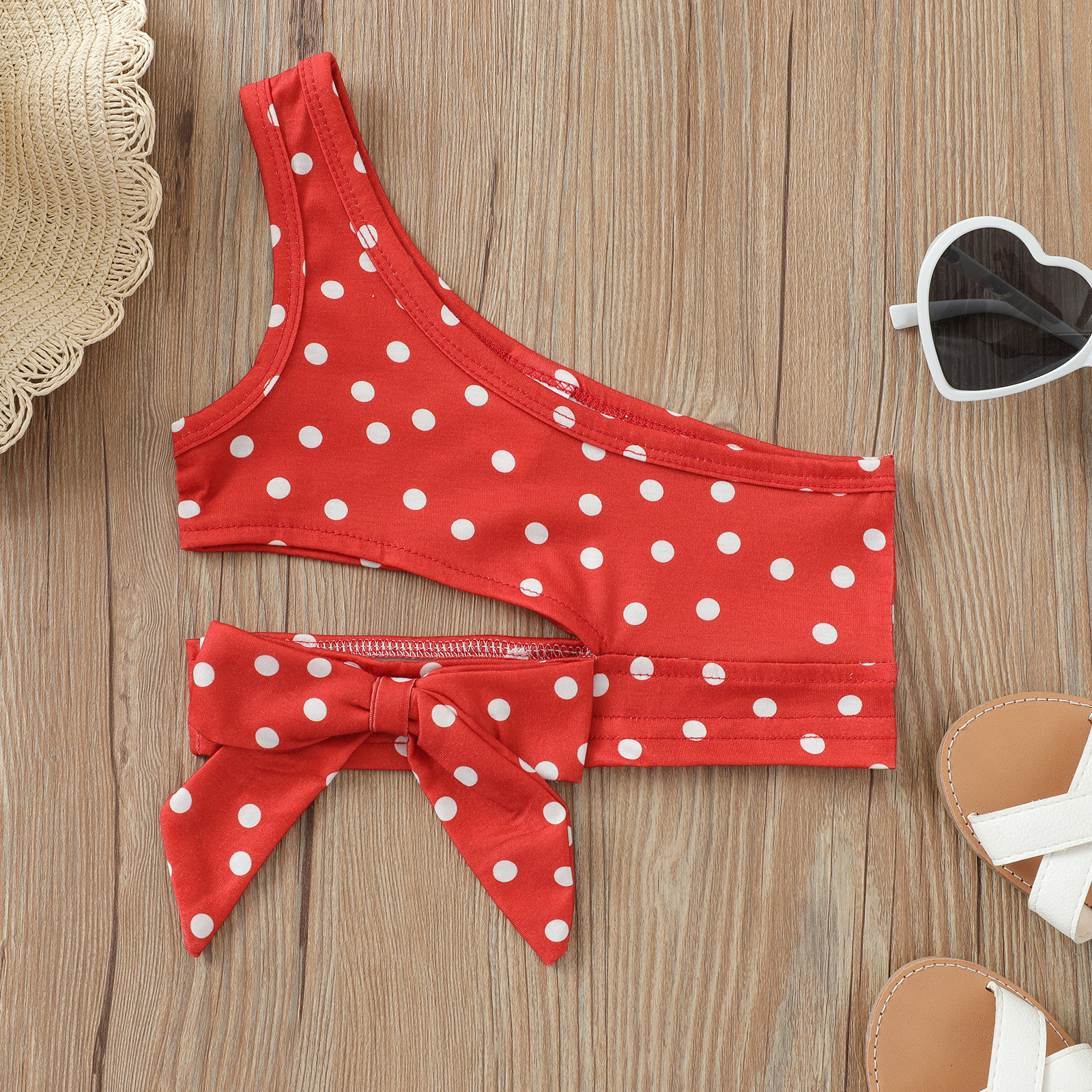 Chaleco transfronterizo para niños verano nuevas niñas Honda Polka Dot ombligo corto Top arco hombro camisa corta europea y americana