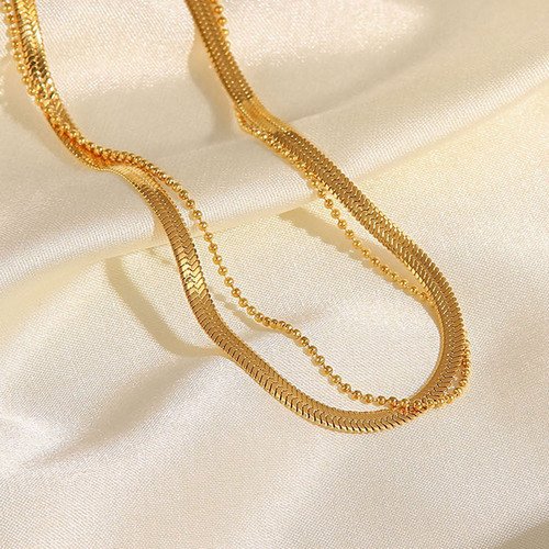 European and American French women's new titanium steel anklet 18K gold polished blade chain snake chain millet bead chain double layer anklet