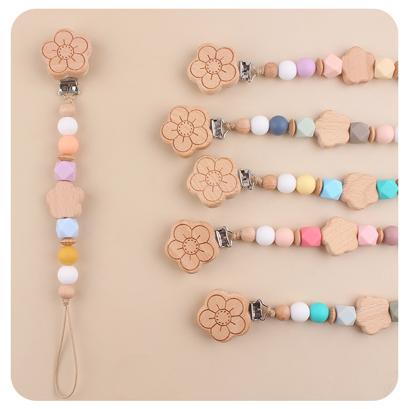 Productos para bebés flores de beech chupeta clips de dibujos animados para bebés flores de beech mordida de dientes molares chupeta cadena de prevención