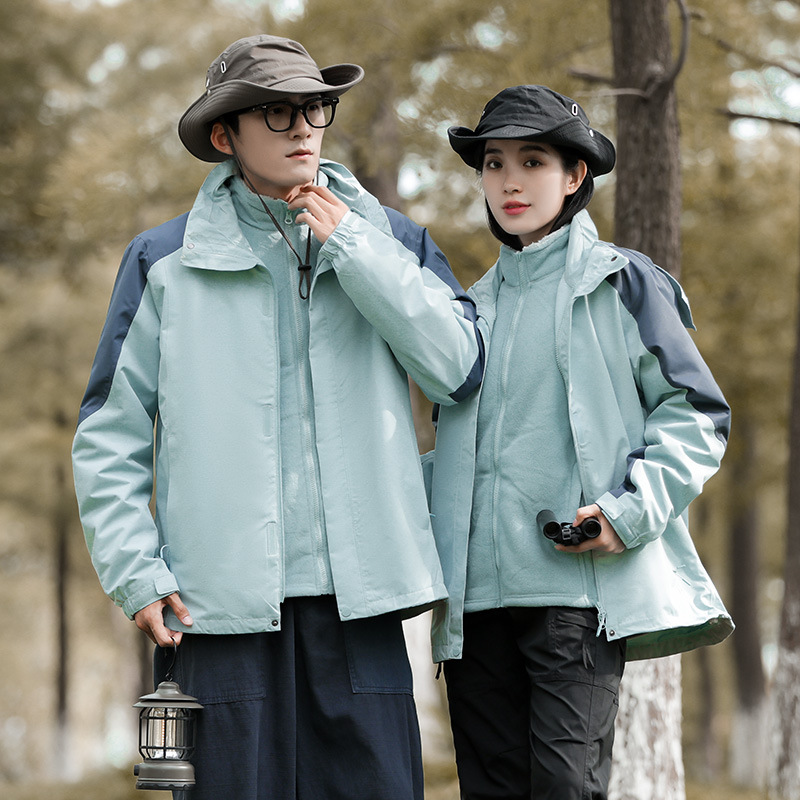 Chaqueta de pareja al aire libre tres en uno de dos piezas coral vellón espesado traje de esquí impermeable se puede imprimir logotipo