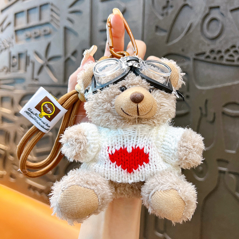 Creativo felpa marea cool oso estudiante mochila colgante muñeca linda pareja llavero pequeño regalo de dibujos animados al por mayor
