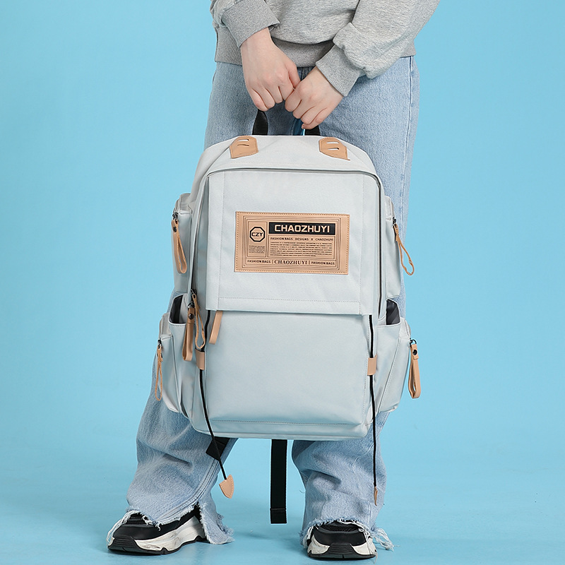2022新款韩版书包女简约时尚大学生中性背包青少年旅行休闲双肩包