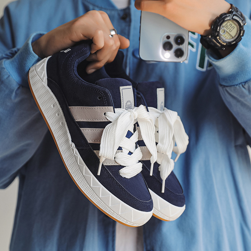 Zapatos zapatos de pan de tiburón original puro para hombre 2025 primavera nueva tendencia zapatos de skate casuales deportivos para jóvenes de todo fósforo