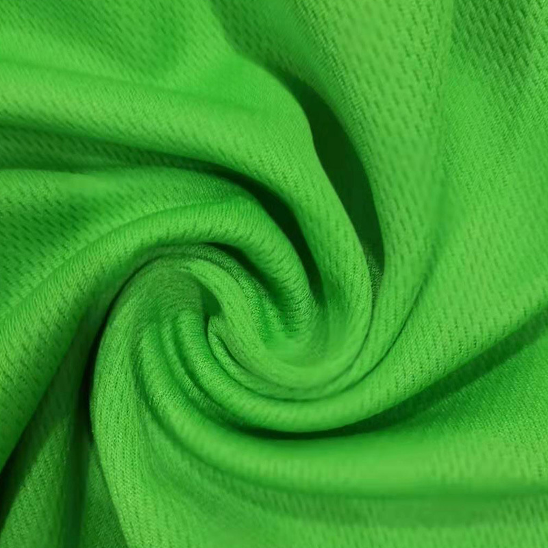春夏时尚透气休闲服运动服面料 舒适75d/36F 涤面料 针织鸟眼布