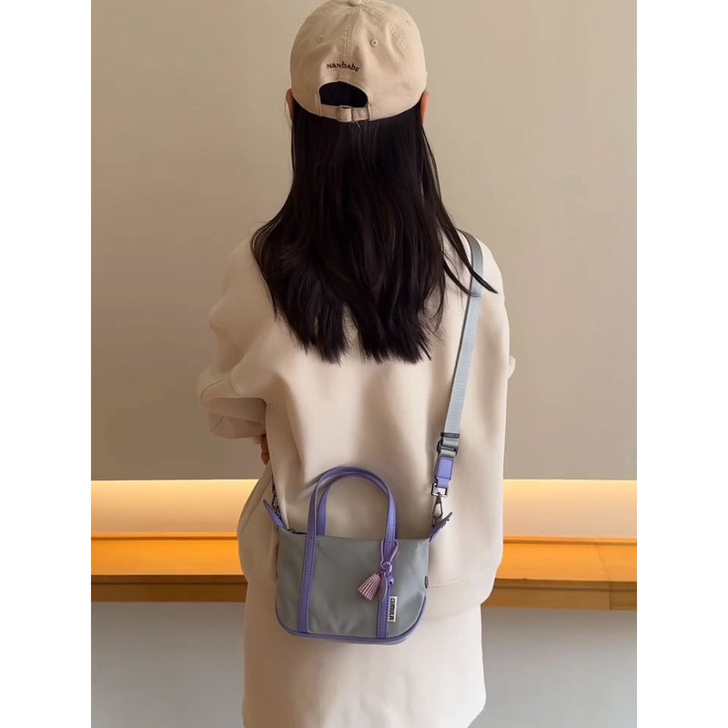韩系复合牛津尼龙帆布包包女2025新款小托特包通勤斜挎单肩饺子包|undefined