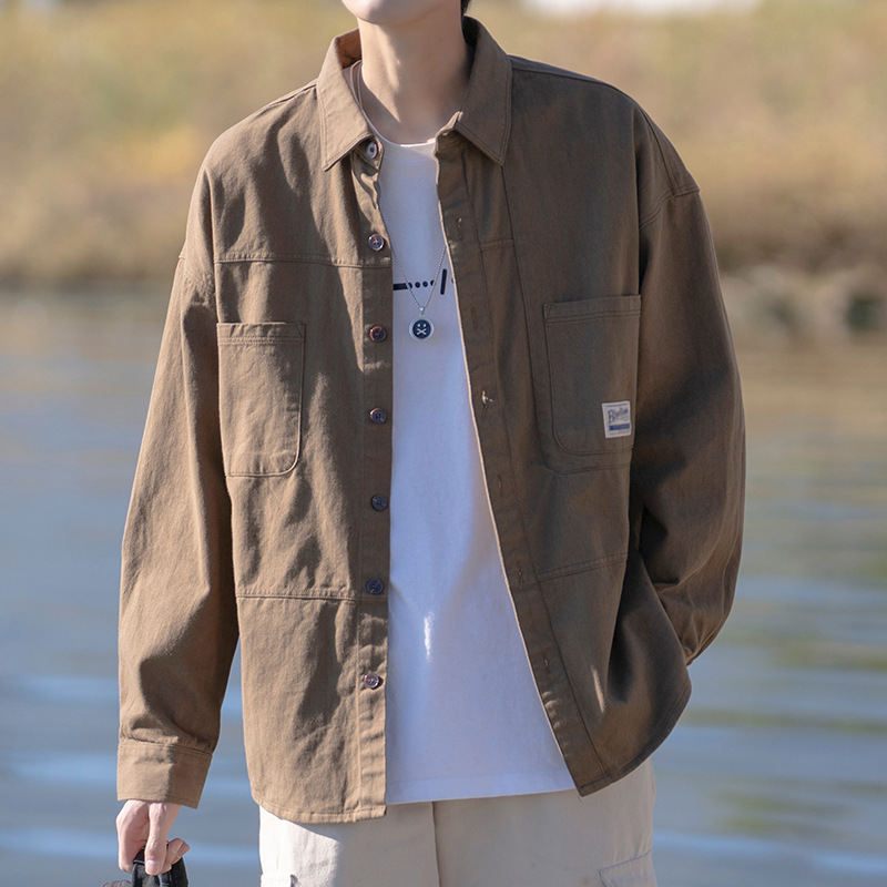 Suministro directo de fábrica camisa de ropa de trabajo de estilo japonés capa de primavera y otoño marca de moda suelta primavera y otoño camisa de manga larga de los hombres