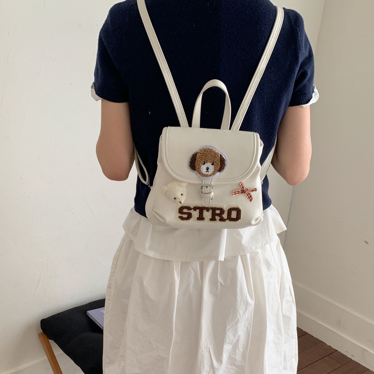 Tide retro nuevo 2026 cachorro nicho de dibujos animados femeninos, mochila coreana, mochila encantadora de moda para viajar