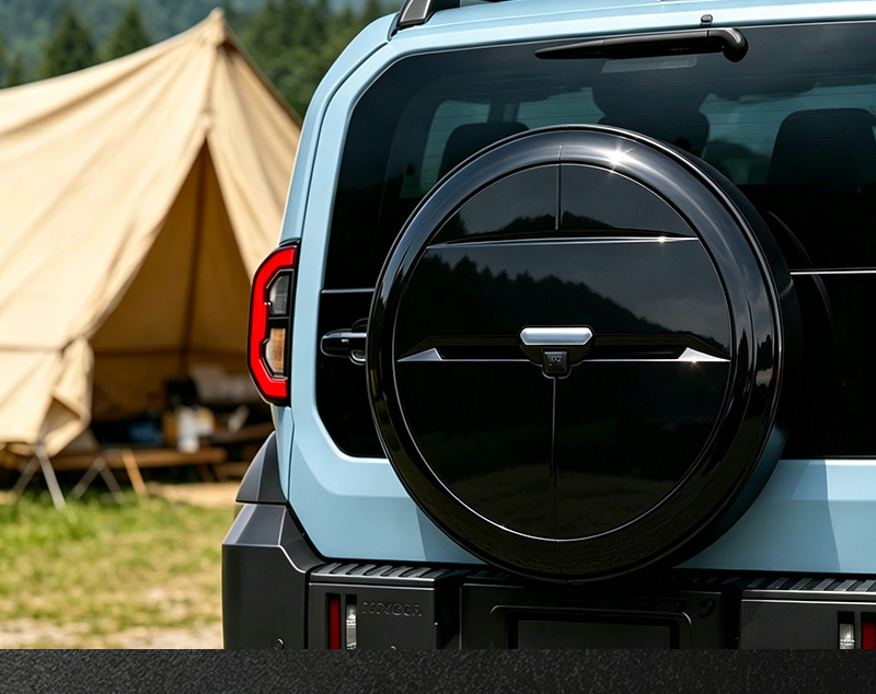 Hard-shell rear-mounted spare tire cover for the 2026 Land Cruiser FJ 265/60R18