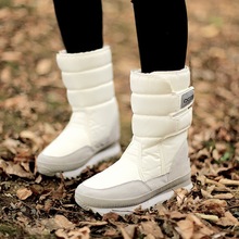新款東北冬季戶外羊毛絨加厚保暖防水防滑中筒韓版雪地靴男女棉鞋