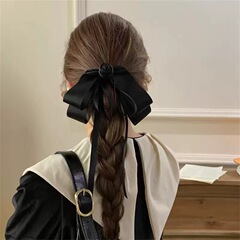 韓国のレトロな黒いツバキの花のリボンのヘアピン2025の新型の後頭部の蝶結びの髪の飾りのトップクリップの女性