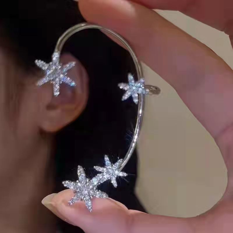 Super Hada copo de nieve oreja percha para mujeres 2022 nueva moda sin orejas de alto grado sentido nicho diseño diamante perla oído hueso clip