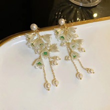 新款珍珠蘭鈴鐺花朵耳環女日韓國氣質長款流蘇耳墜設計感甜美