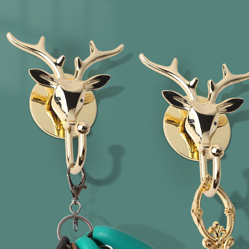 Metal sólido animal cabeza fuerte gancho sin costuras fácil almacenamiento creativo gancho pegajoso hogar diario luz lujo ropa gancho