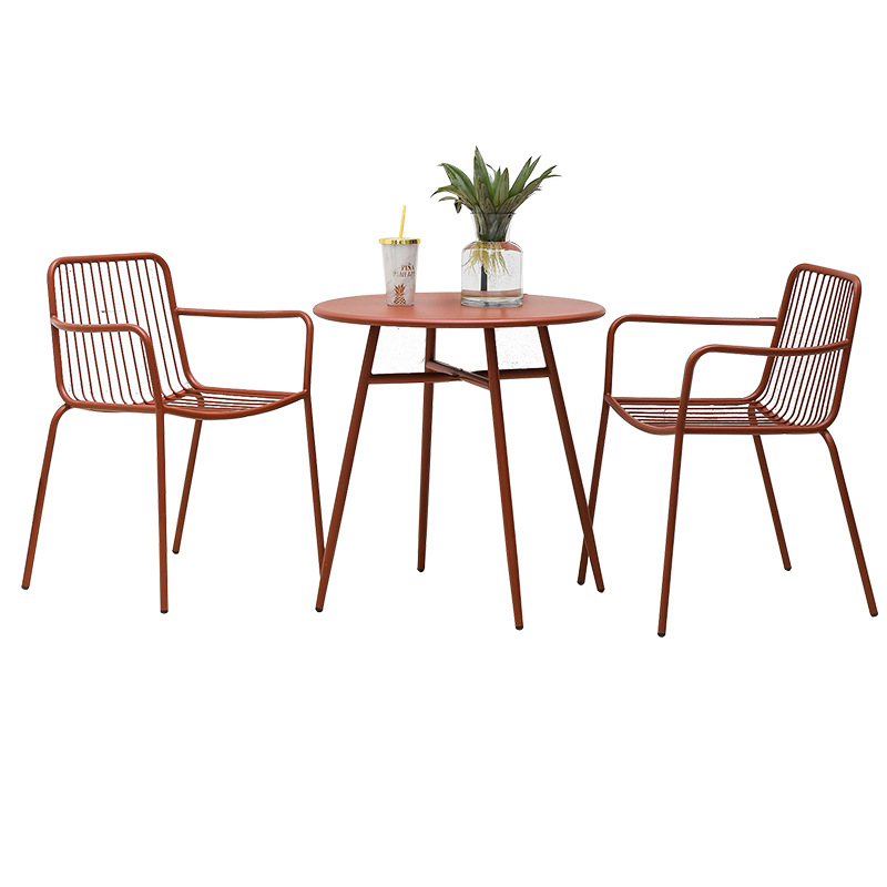 Mesa y silla al aire libre simple Villa patio jardín tienda de té de leche resistente al óxido impermeable mesa y silla de cocina relacional combinación de tres piezas
