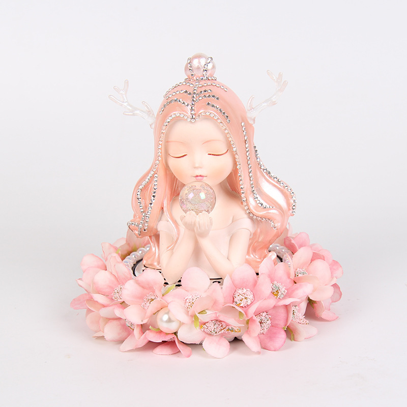 Nuevos productos creativos Adornos de aromaterapia para interiores de automóviles Hermoso ángel y base de flores que contiene piezas de fragancia y fragancia duradera