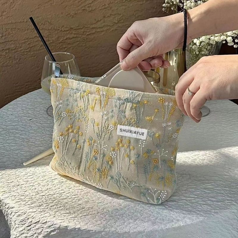 Retro literatura elegante portátil bolsas de maquillaje 2024 nuevo bolsas de maquillaje original nicho diseño mayorista