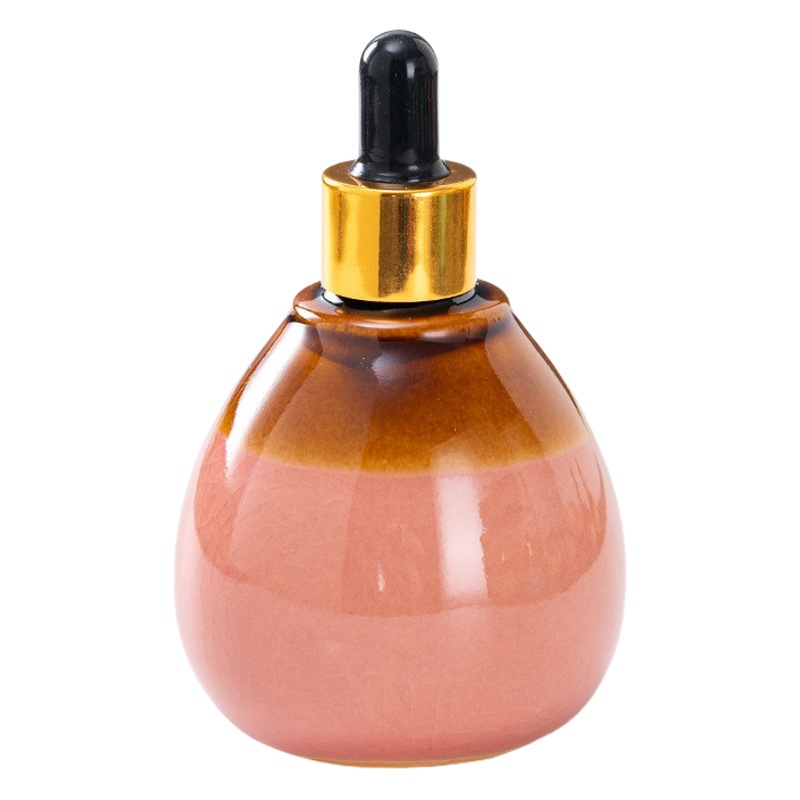 Cuentagotas de vidrio de alta calidad Esencia de aceite esencial de cerámica Cuidado de la piel botella salón de belleza spa tailandés aromaterapia spa botella de despliegue