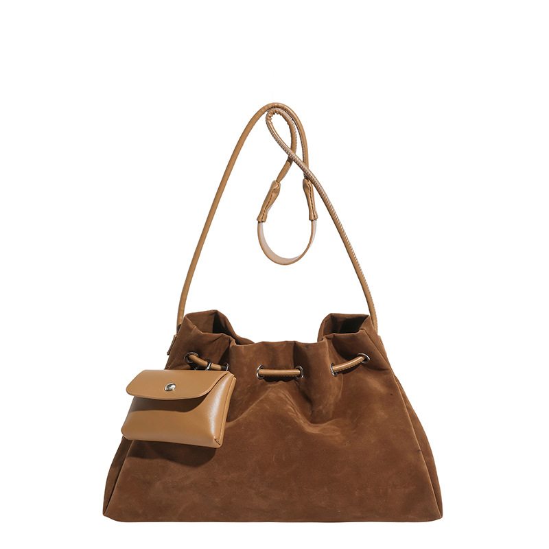 Bolsa de invierno de mujer 2025 nuevo estilo de moda de alta calidad sensación ligera de lujo bolso de cubo de cuerda de dibujo bolso de hombro