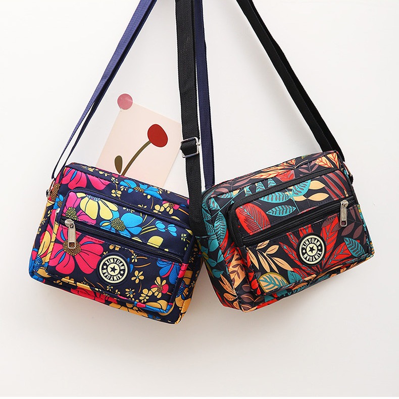 Bolsa de tela de flores bolsa de mensajero de las mujeres nueva bolsa de Madre de gran capacidad bolsa de hombro individual de mediana edad y ancianos bolsa de tela Oxford bolsa