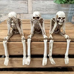 国境を越えた新しい吊り足の頭蓋は、ハロウィーンのイースター祭の家庭庭園装飾樹脂工を聞かない