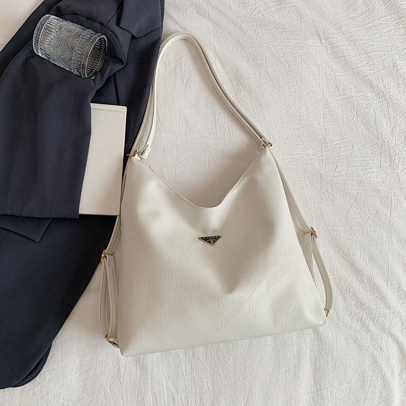 Bolso de mujer de gran capacidad primavera y verano 2025 nuevo tipo de mochila de cadena mochila de hombro de alta calidad sensación de viaje bolsa