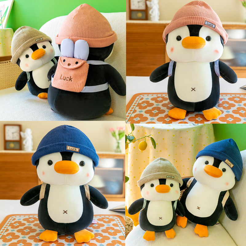 新款可爱企鹅公仔毛绒玩具旅行企鹅背包玩偶海洋馆呆萌企鹅批发