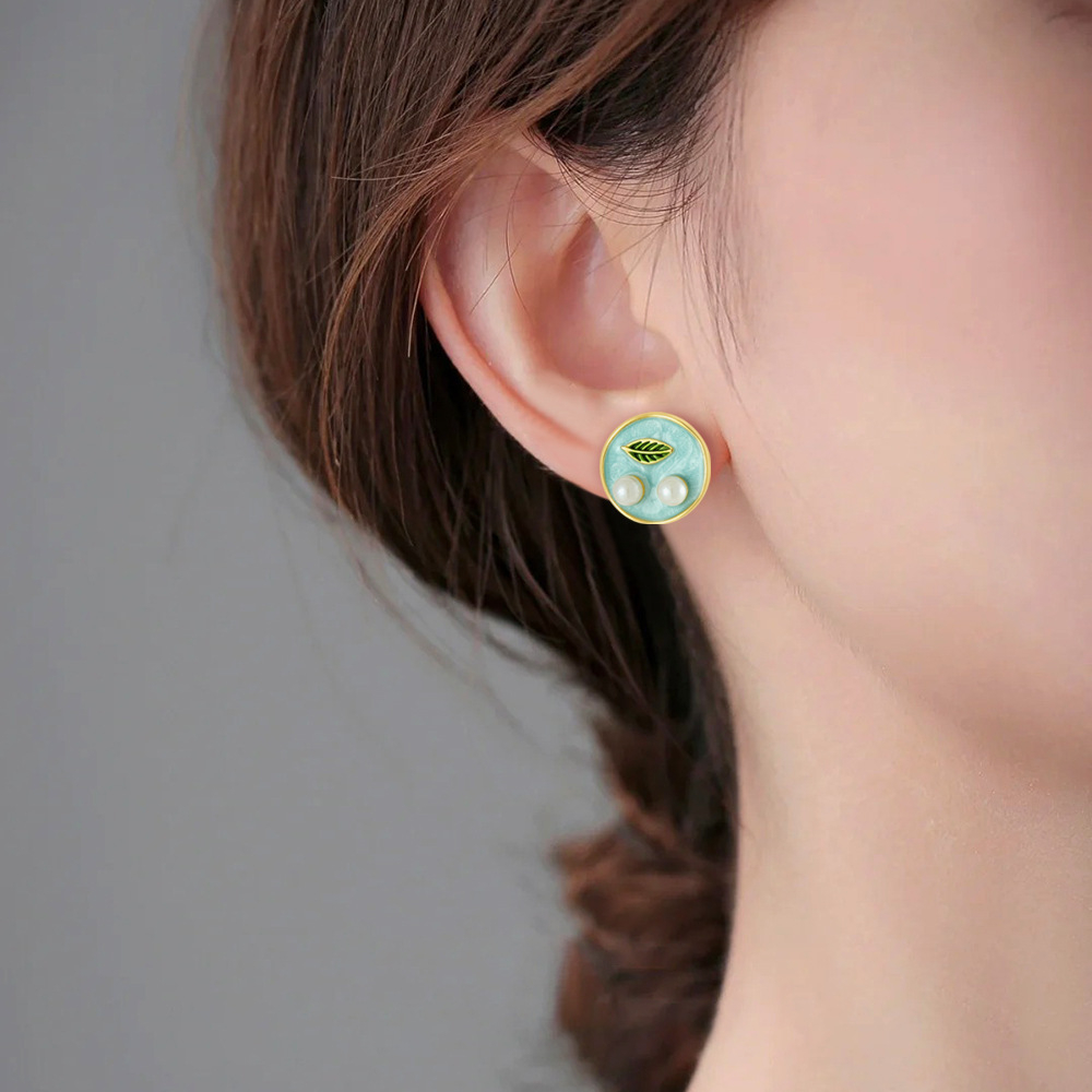 Pendientes de diseño de hojas de aceite de goteo redondo de estilo de pintura al óleo retro de alta gama Pendientes de perlas de temperamento de nicho francés