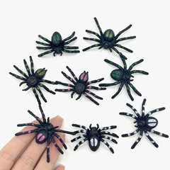 シミュレーションのクモのおもちゃの小さい花のクモの黒色は人を怖がらせます。
