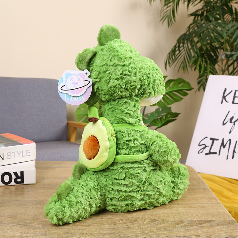 Mochila transfronteriza de aguacate, muñeca de dinosaurio, cama para niños, almohada, peluche, niña, muñeca para dormir, dragón de flores cepillado