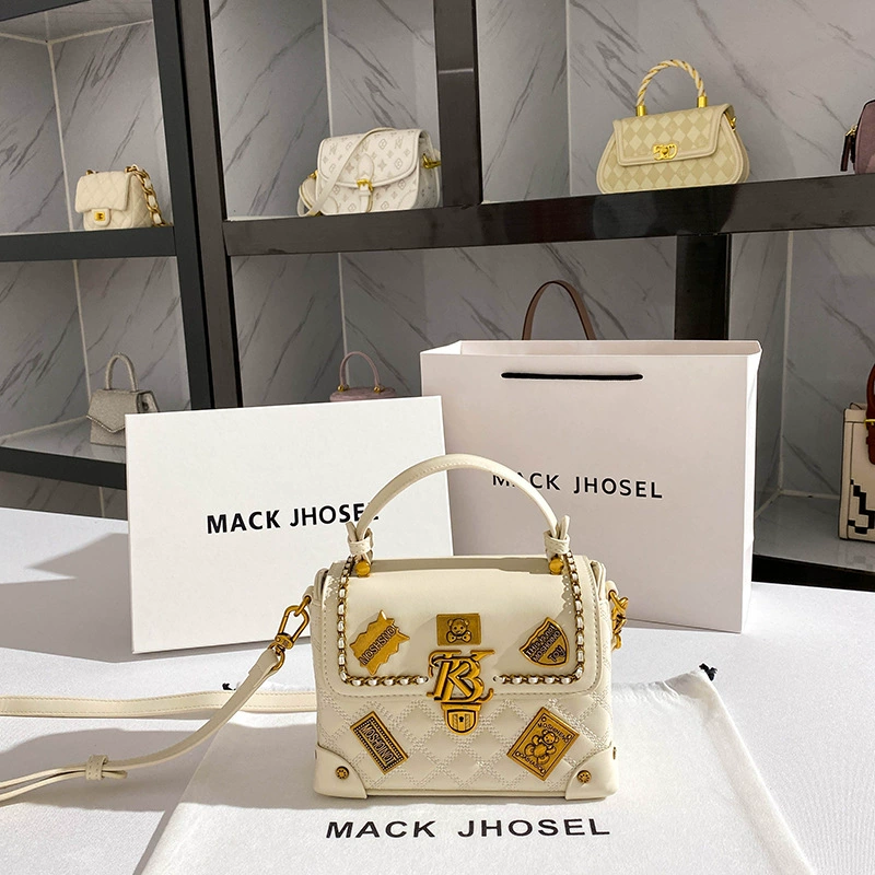 Handheld bag with diamond pattern, small badge, box, 2023, Chanel style