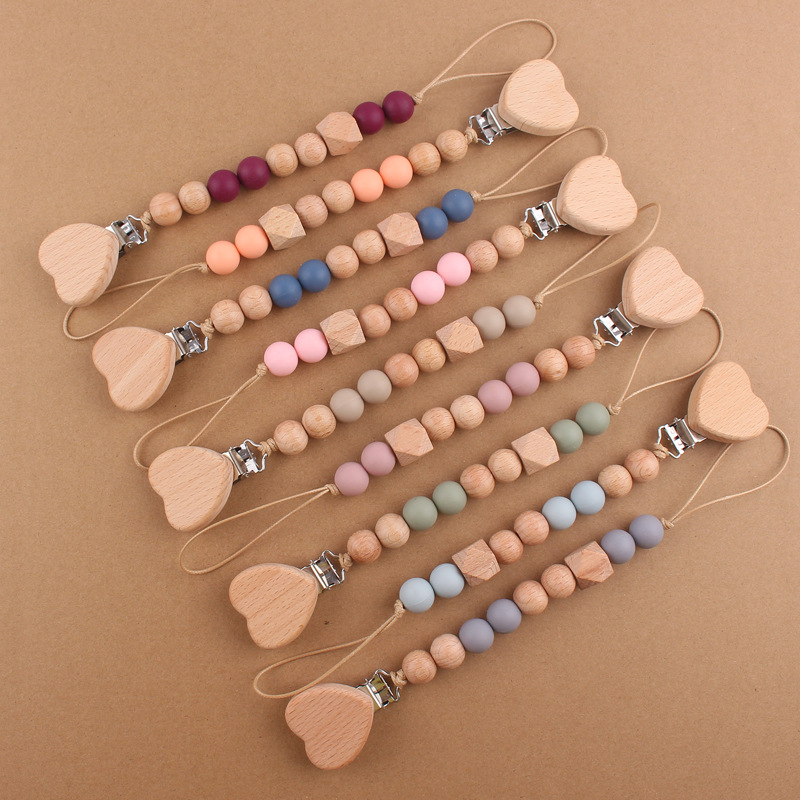 Nuevos suministros para bebés de dibujos animados amor haya chupete clip creativo bebé cuentas de silicona mordedura molar chupete cadena