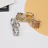 Golden shark with bow, crab pin, hairgrip, hair accessory, simple and elegant design, new collection