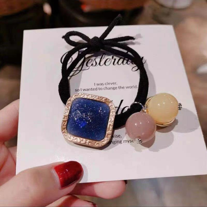 Elástico joyas de cabello de moda con frijoles frescos M anillo de cereza cuerda de cabello al por mayor de la banda de goma cabeza de 100 bolas de cabello rojo una variedad de alta elástica