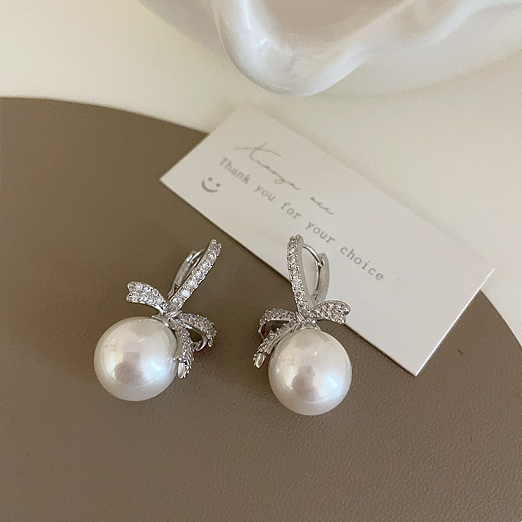 Design retro universal elegant earrings with zircon with bow from…