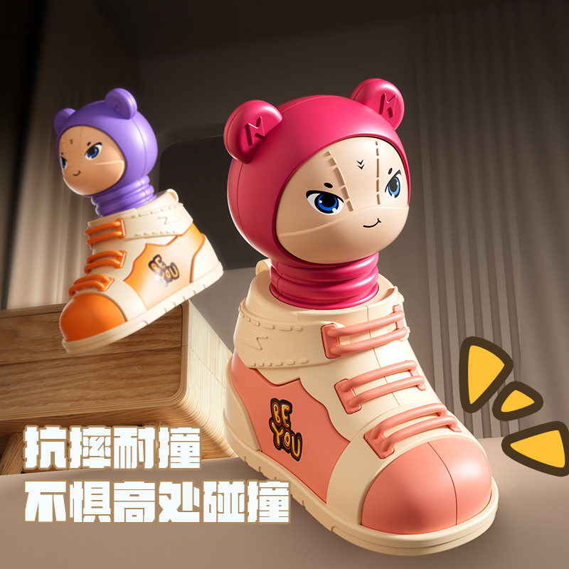 Los juguetes para niños presionan los zapatos de dibujos animados que se pueden cargar con azúcar, se pueden devolver a la inercia, los juguetes educativos, los puestos de regalos, los puestos al por mayor