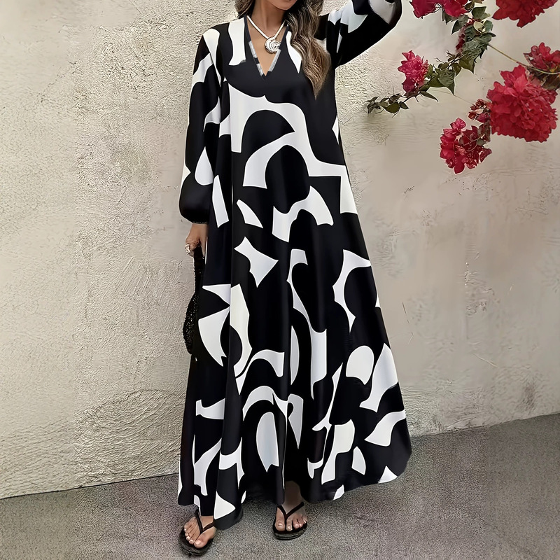 2026 In-stock European and American plus-size women's dress with blue and white geometric print, long sleeves, loose fit, round neck, and a flowing hem