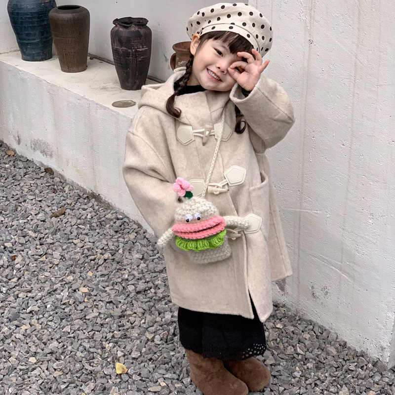 Otoño y invierno nuevos bolsos infantiles, boca de salchicha feia, lindos bebés mochilas, productos terminados ganchos, bolsos de hombro para niños y niñas