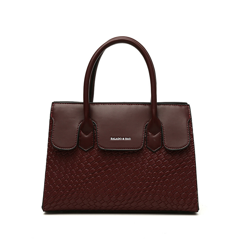 Comercio exterior transfronterizo Bolso de mujer 2024 nueva moda retro europea y americana en relieve hombro crossbody portátil de gran capacidad al por mayor