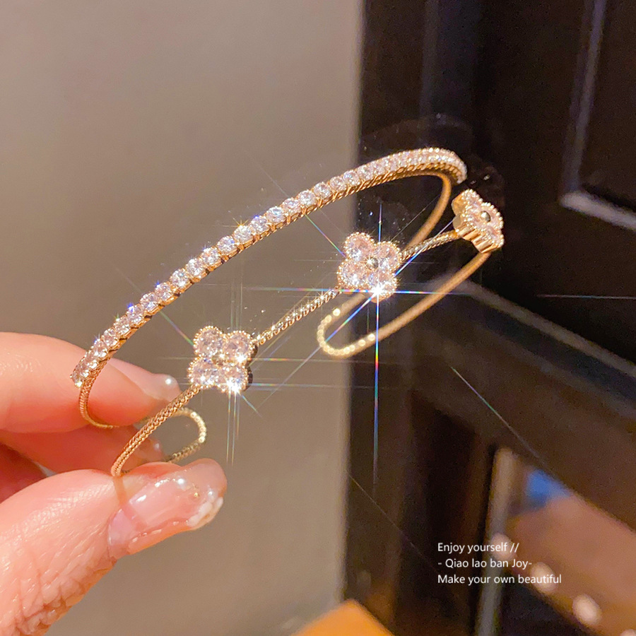 ジルコンの花の十字の二重の開口の腕輪の軽くて豪華な高級感の手環のファッションのinsの百合の手飾りの卸売り