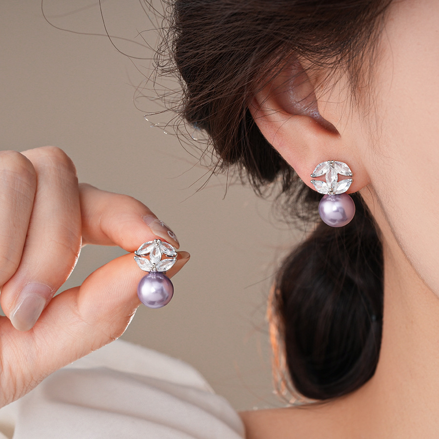 Pendientes de flor de lazo elegante de súper hada de plata Pendientes de moda de lujo ligero francés Pendientes de todo fósforo dulce de estilo literario