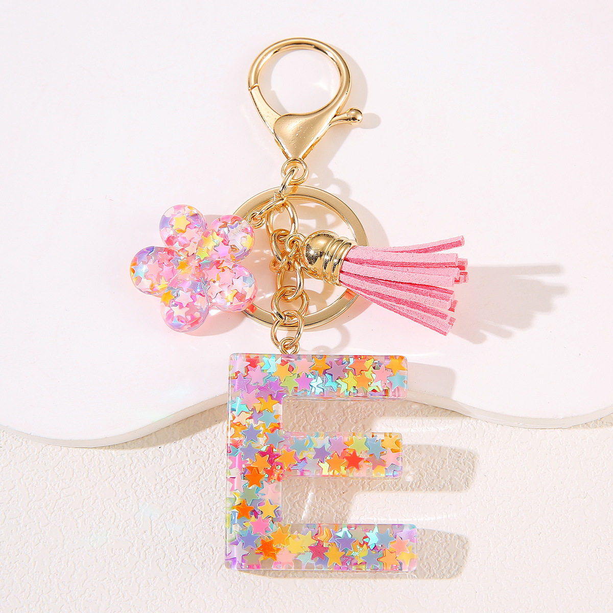 Un nuevo llavero flor de goteo de goma esquinilla 26 letras bolsos colgante llavero accesorios Yiwu