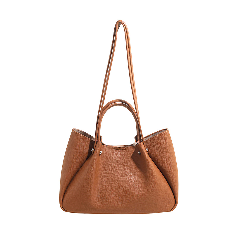 Bolso coreano nicho bolso de brazo bolso de mujer 2026 nueva gran capacidad de transporte universal bolso de hombro
