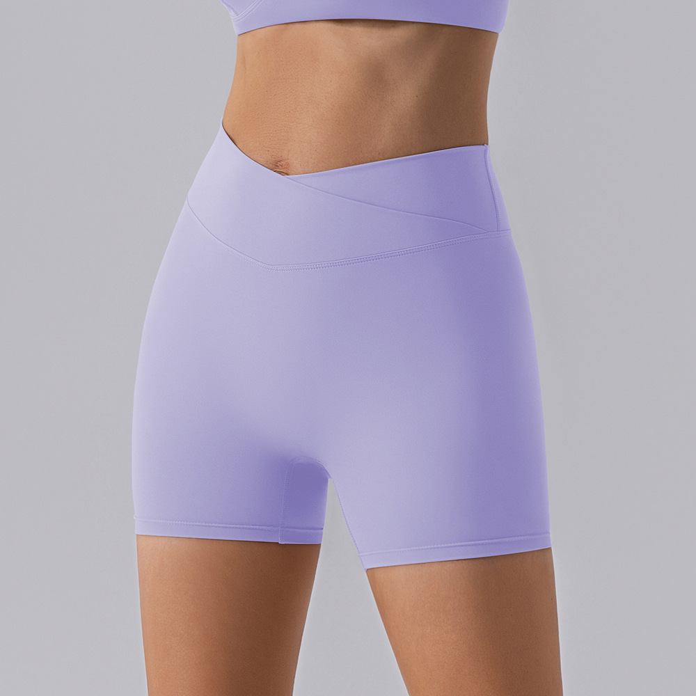 Procesamiento personalizado europeo y americano elástico mel桃 hips fitness pantalones cortos desnudos secado rápido sexy para elevar las hips de yoga de mujer panty