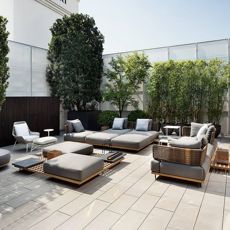 Sofá de ratán al aire libre Patio nórdico Jardín de madera maciza Balcón Arte de ocio Silla de ratán Combinación Muebles de ratán al aire libre