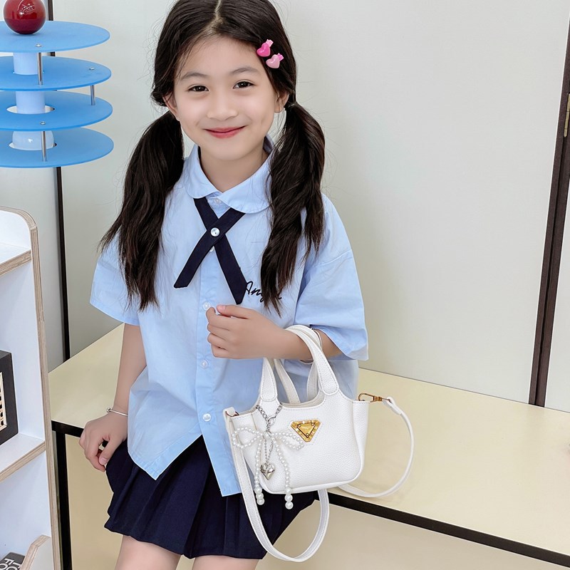 Bolso de canasta de comida portátil para niña lindo bolso de mensajero para niños con lazo de perlas mini bolso para niños de color sólido