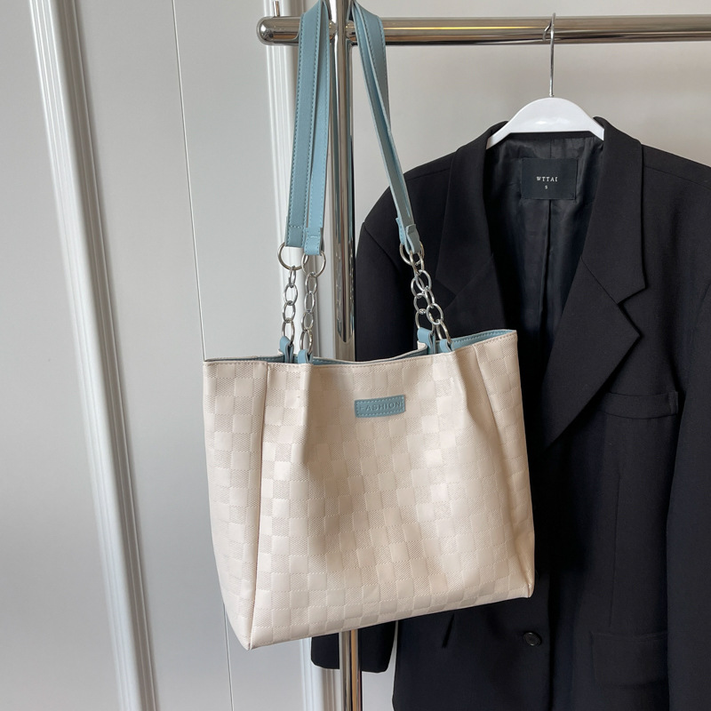 Bolsa de hombro a cuadrillas de alto nivel 2024, nueva bolsa de viaje simple de gran capacidad para estudiantes universitarios.