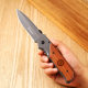 Hot sale source factory wooden handle high hardness portable self-defense folding knife sharp durable outdoor knife bone-breaking fruit folding knife